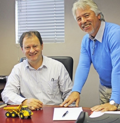 Bell Equipment - Strong values and reliable products keep Afrimat loyal to Bell:CEO of Afrimat, Andries van Heerden with Bell Equipment Sales Representative, Clifton Roberts